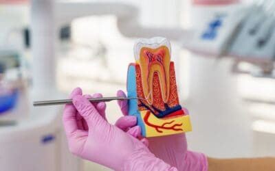 Dentist sealing tooth after root canal procedure